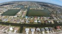 FRESHWATER LOT with boating access to the Shamrock Lakes for sale in Cape Coral Florida Lee County County on GolfHomes.com