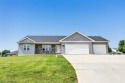 Welcome to this 3-bedroom, 2-bath home in Luxemburg, built in for sale in Luxemburg Wisconsin Kewaunee County County on GolfHomes.com
