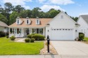 Enjoy your own private, heated pool with a screened enclosure for sale in Murrells Inlet South Carolina Georgetown County County on GolfHomes.com