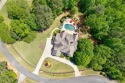 VERSATILE, PRIVATE ESTATE WITH $120K UPGRADES. No temporary for sale in Alpharetta Georgia Cherokee County County on GolfHomes.com
