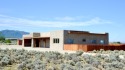 This is a remarkable custom home built in 2025 by renowned local for sale in Ranchos de Taos New Mexico Taos County County on GolfHomes.com
