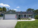 Exquisite waterfront home in the gated golf community of Pelican for sale in Daytona Beach Florida Volusia County County on GolfHomes.com