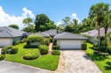 Premium pool-lot home in the quiet enclave of Glens East at for sale in Boynton Beach Florida Palm Beach County County on GolfHomes.com