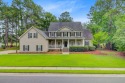 Welcome to this grand Southern-style home perfectly positioned for sale in Summerville South Carolina Dorchester County County on GolfHomes.com