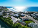 Discover the allure of coastal living in the exclusive, guard for sale in Dana Point California Orange County County on GolfHomes.com