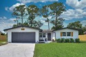 Golf course living redefined! Located on a quiet cul-de-sac for sale in Holly Hill Florida Volusia County County on GolfHomes.com