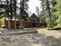 Expansive multi-level lakefront residence located in one of the for sale in Taos New Mexico Taos County County on GolfHomes.com