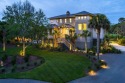 Set along the picturesque 11th hole of a Rees Jones Championship for sale in Johns Island South Carolina Charleston County County on GolfHomes.com