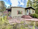 Charming mountain retreat located in the desirable Valle for sale in Taos New Mexico Taos County County on GolfHomes.com