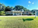 Prime Dunedin Investment / Redevelopment Opportunity! This half for sale in Dunedin Florida Pinellas County County on GolfHomes.com