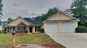 This renovated 3 bedroom, 2 bathroom home offers modern living for sale in Lithonia Georgia De Kalb County County on GolfHomes.com