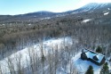 Amazing location on the 6th green at Sugarloaf's Golf Course and for sale in Carrabassett Valley Maine Franklin County County on GolfHomes.com