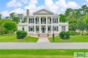 This fully renovated estate home, situated at the prestigious for sale in Richmond Hill Georgia Bryan County County on GolfHomes.com