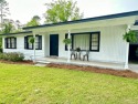Charming 3-Bedroom Home Near Douglas Golf & Country Club Tucked for sale in Douglas Georgia Coffee County County on GolfHomes.com