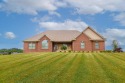 Welcome to this custom-built gem nestled in the serene community for sale in Lawrenceburg Kentucky Anderson County County on GolfHomes.com