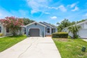 Experience breathtaking lake views from this adorable 3 bedroom for sale in Sanford Florida Seminole County County on GolfHomes.com