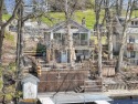 Nestled along 40 feet of pristine lake frontage in vibrant Cold for sale in Hamilton Indiana Steuben County County on GolfHomes.com