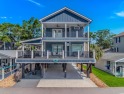 LUXURY at the BEACH!!! This 4 bedroom 3.5 bath raised beach for sale in Myrtle Beach South Carolina Horry County County on GolfHomes.com
