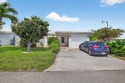 Welcome to this stunning 2-bedroom, 2-bathroom corner home for sale in Pompano Beach Florida Broward County County on GolfHomes.com