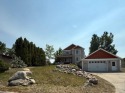 Welcome to this stunning 4-bedroom, 4-bathroom home nestled for sale in Sidney Montana Richland County County on GolfHomes.com