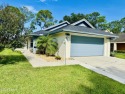 Surrounded by a previous golf course, there is luscious green for sale in Daytona Beach Florida Volusia County County on GolfHomes.com