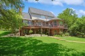 Discover the epitome of elegance in this spacious 3-story for sale in Whitney Texas Hill County County on GolfHomes.com