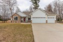This stunning Craftsman 4bed, 3bath home offers luxury living for sale in Waupaca Wisconsin Waupaca County County on GolfHomes.com
