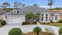 One or more photo(s) has been virtually staged. Short Sale for sale in Palm Coast Florida Flagler County County on GolfHomes.com