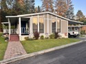Over 55 Waterfront Community!  This beautiful 2 bed 2 bath for sale in Liberty Lake Washington Spokane County County on GolfHomes.com