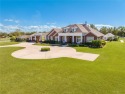 EXQUISITE EQUESTRIAN RETREAT SITUATED ON OVER 5 ACRES. WELCOME for sale in Kissimmee Florida Osceola County County on GolfHomes.com