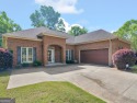 This gorgeous 3 bedroom/2.5 bathroom brick home is located on for sale in Mcdonough Georgia Henry County County on GolfHomes.com