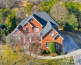 Welcome to this elegant brick home in a prime Tega Cay location for sale in Fort Mill South Carolina York County County on GolfHomes.com