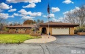 Experience exceptional living in this charming Spanish-style for sale in Gardnerville Nevada Douglas County County on GolfHomes.com