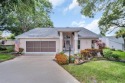 Beautifully updated 2-bedroom, 2-bathroom home with a large for sale in Palm Harbor Florida Pinellas County County on GolfHomes.com