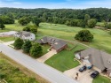 Experience refined golf course living in this stunning, fully for sale in Pea Ridge Arkansas Benton County County on GolfHomes.com