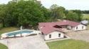 Welcome to this stunning, fully remodeled 3348 ft. four-bedroom for sale in Stigler Oklahoma Haskell County County on GolfHomes.com