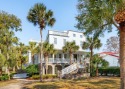 Experience timeless charm in this fully furnished Isle of Palms for sale in Isle of Palms South Carolina Charleston County County on GolfHomes.com