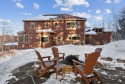 This exquisite home sits behind the hole 7 Green on the Sunday for sale in Newry Maine Oxford County County on GolfHomes.com