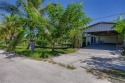 Florida Living at Its Finest - Island Life Meets Income for sale in Bokeelia Florida Lee County County on GolfHomes.com