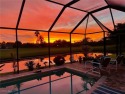 Spectacular Sunsets from your Lanai on the lake  golf course in for sale in Bonita Springs Florida Lee County County on GolfHomes.com