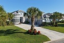 Welcome to an exceptional coastal estate in the private for sale in Palm Coast Florida Flagler County County on GolfHomes.com