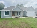 Experience lake-area living in this beautifully designed new for sale in Bella Vista Arkansas Benton County County on GolfHomes.com