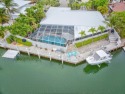 A beautifully upgraded waterfront home in Marathon's desirable for sale in Marathon Florida Monroe County County on GolfHomes.com