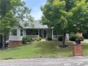 This beautifully updated and maintained 3-bedroom, 2  1/2  -bath for sale in Holiday Island Arkansas Carroll County County on GolfHomes.com