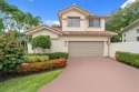 FULLY TURNKEY 4BR/3.5BA pool home in the elite Laurel Pointe at for sale in Boca Raton Florida Palm Beach County County on GolfHomes.com