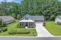 Welcome to your dream home in the highly sought-after gated golf for sale in Murrells Inlet South Carolina Georgetown County County on GolfHomes.com