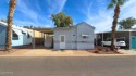 Enjoy resort-style living in this 1-bedroom, 1-bathroom home for sale in El Mirage Arizona Maricopa County County on GolfHomes.com