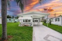 Adorable 3 bedroom, 2 bath home with new  laminate flooring for sale in Port Saint Lucie Florida Saint Lucie County County on GolfHomes.com