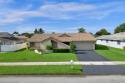 Stunning 3-bed, 2-bath home in Margate! Modern open-concept for sale in Margate Florida Broward County County on GolfHomes.com