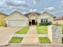 Golf Course Living! Water View! Beautiful Home with Back Yard for sale in Edinburg Texas Hidalgo County County on GolfHomes.com